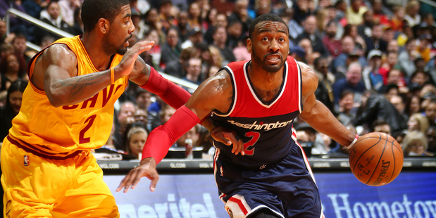 John Wall handles the ball against the Cleveland Cavaliers. Photo / Getty Images