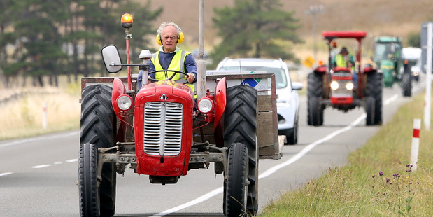 TRACTORS FOR A CAUSE: The Tractor Trek travelling on SH3 just south of Turakina. PHOTO/STUART MUNRO