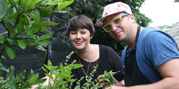 Delaney Mes cooks food with Giapo Grazioli and Annarosa Grazioli today. Pictured is Giapo and Delaney picking herbs from his garden. Photo / Doug Sherring