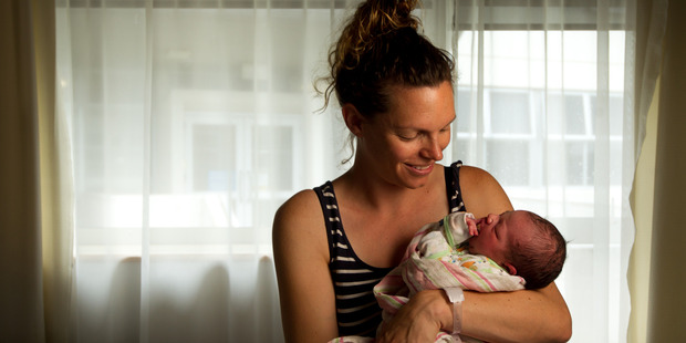 Mother Brooke Thompson with her leap year baby Harper Matthews. Photo / Stephen Parker
