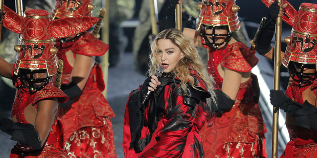 Madonna landed at Auckland airport on Tuesday ahead of her Saturday show, but has managed to avoid the spotlight and her fans. Photo / AP