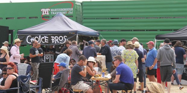 A wall of trucks protects Martinborough Brewday stallholders and punters. PHOTO/ANDREW BONALLACK