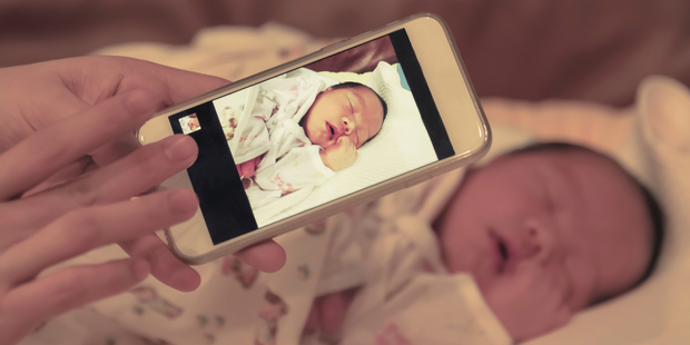 Children could sue parents over photos posted to social media. Photo / iStock