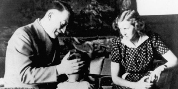 Adolf Hitler and Eva Braun with a little girl around 1940. Photo / Getty Images