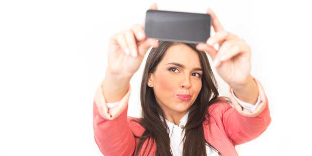 Thanks to a new app, a selfie could be your passport photo. Photo / iStock