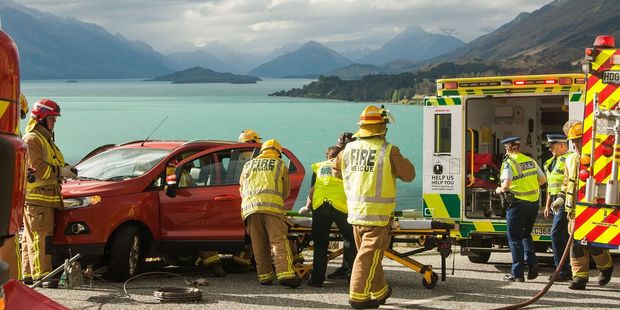 The woman was taken to hospital with minor injuries to her lower legs. Photo / James Allan