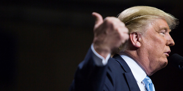 Republican presidential candidate Donald Trump fires up the crowds at a campaign rally. Photo / Getty Images