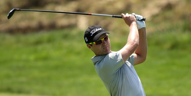 Matthew Griffin plays a shot during round one of the 2012 Australian Open. Photo / Getty Images