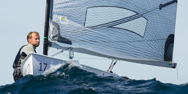 Josh Junior in action during Day 6 of the 2014 ISAF Sailing World Championships. Photo / Getty Images