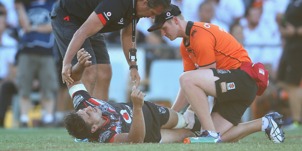 Warriors fans feared the worst when Ben Henry suffered a knee injury against the Tigers. Photo / Getty