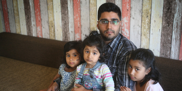 Farhan Sattar with his daughters Aaliya, Saniya and Lamiya were abused by an irate bus driver. Photo / Doug Sherring