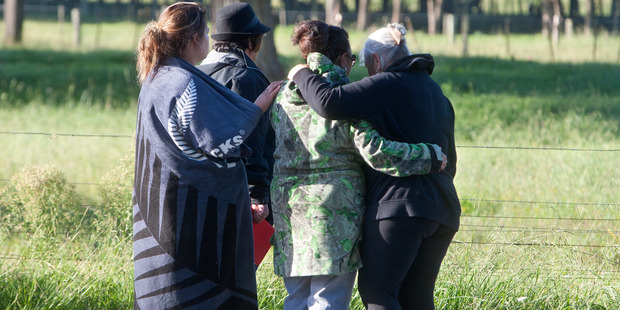 Family and friends at the cordon during the Kawerau siege. Photo / Ben Fraser
