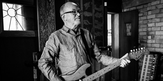 Dave Dobbyn lives a few metres away from his workplace. But he still has his standards about office attire. Photo / Supplied
