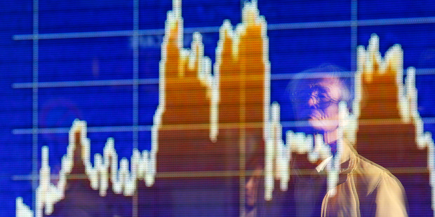 Lower interest rates during downturns have also led to numerous asset bubbles in property and shares over the past 30 years. Photo / AP