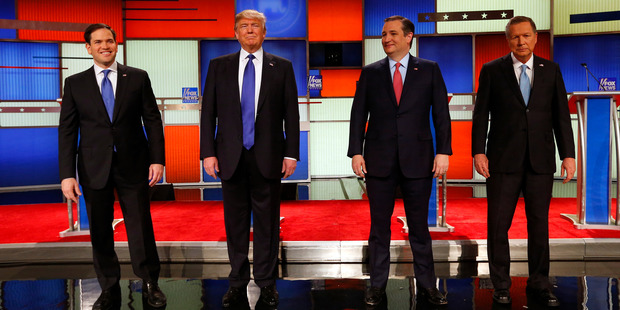 Republican presidential candidates, Sen. Marco Rubio, R-Fla., businessman Donald Trump, Sen. Ted Cruz, R-Texas, and Ohio Gov. John Kasich take the stage before a Republican presidential primary debate