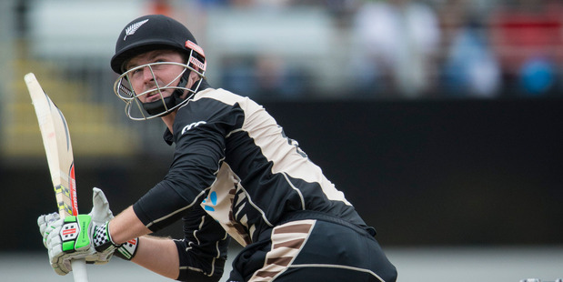 Black Cap Colin Munro clubbed 67 off 34 balls with seven sixes against Sri Lanka in Mumbai yesterday. Photo / Jason Oxenham.