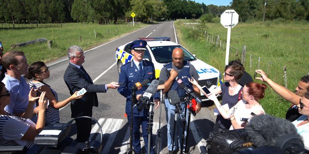 Police comissioner Superintendent Mike Bush (left) fronts media along with Taupo police area commander Warwick Morehu at Onepu Springs Rd after the gunman was taken into custody. Photo / Nick Reed