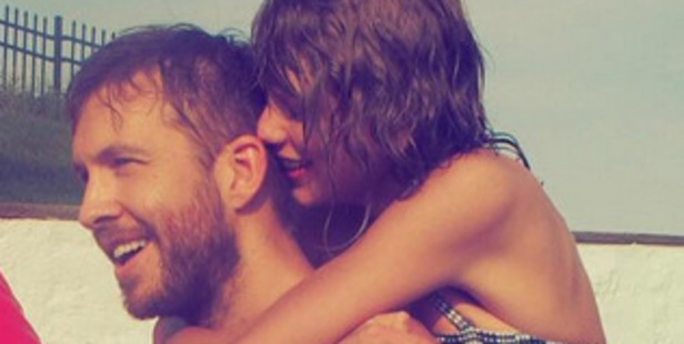 Taylor Swift and Calvin Harris during a beach holiday together.