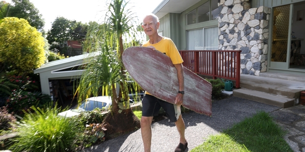 Don Edge used to surf on this old coffin lid which had been steamed into shape at the back and turned up slightly in front. Photo / Michael Cunningham