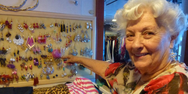 Lee Wachtstetter points out an earring holder made by one of the crew on the cruise ship on which she have lived for eight years. Photo / Si Liberman