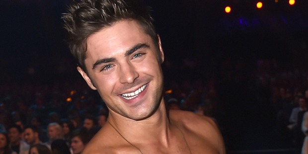 Zac Efron has been working hard to get buff for Baywatch. Photo / Getty