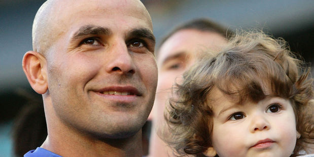 Hazem El Masri with his first daughter. Photo / Getty