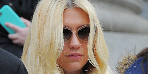 Kesha seen leaving the court house with her family after losing her case on February 19. Photo / Getty