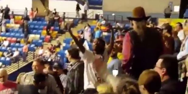The protester was punched as he was leaving the rally by a Donald Trump supporter. Photo / YouTube