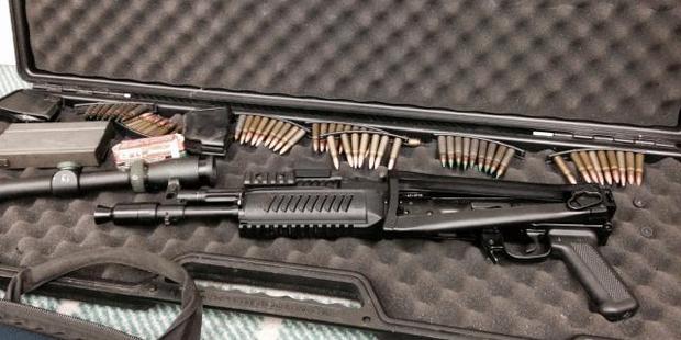 A stash of high powered military rifles including 14 AK47's and M16's were found. Photo / Supplied via Police