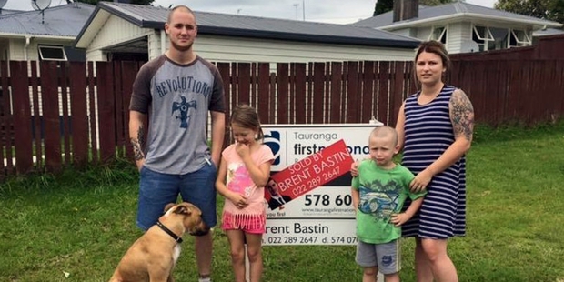 Vanessa Jones, pictured with husband Mike, kids Ella and Carter and dog Zeus, sold their house in two weeks.