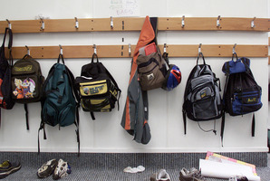 School bags and kids shoes line the corridor at a small country school. Photo / Greg Bowker
