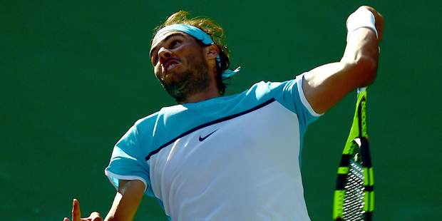 Rafael Nadal of Spain serves during his straight set victory over Fernando Verdasco. Photo / Getty Images
