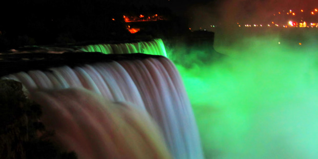 The Niagara Falls are illuminated green for St Patrick's Day. Photo / Supplied