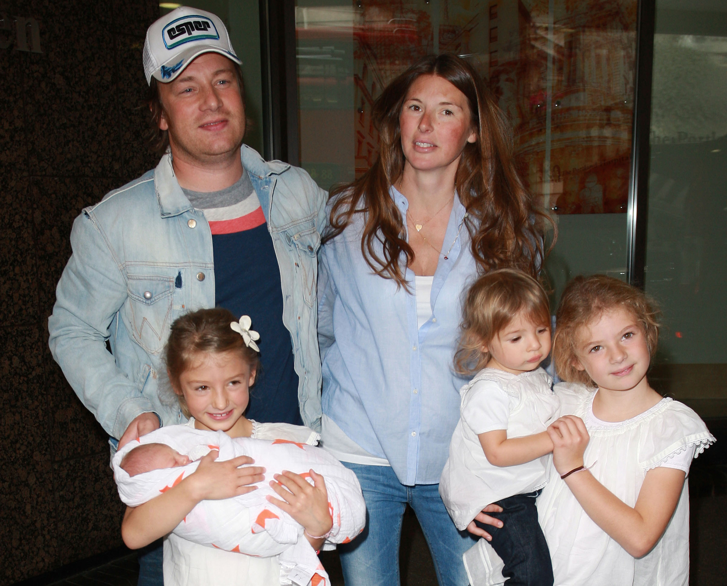 Jamie and his family after the birth of his son, Buddy Bear. Photo / Getty