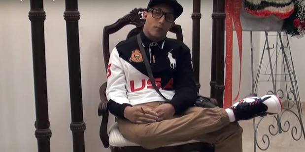 The body of San Juan was seated with his eyes open, and clothed in sports gear while holding a cigarette. Photo / Ruptly