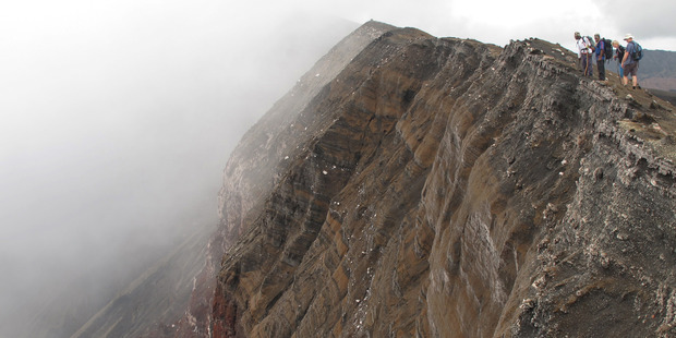 On the rim of Mt Benbow's crater. Photo / Peter de Graaf