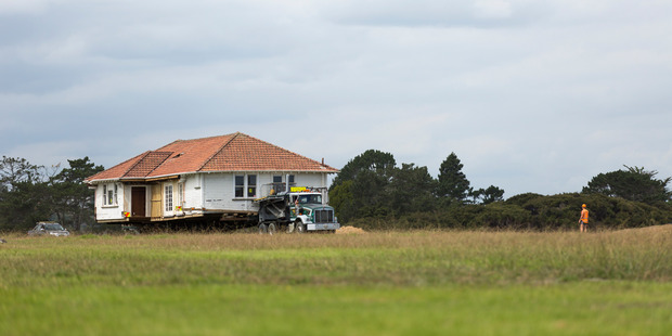 The Hobsonville Point house on the move. Photo / Supplied