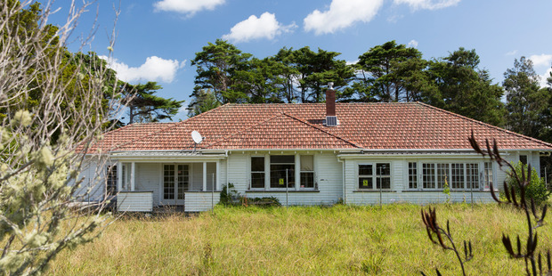 The Hobsonville Point base Commander's former house prior to its move to the northern end of Sunderland Ave. Photo / Supplied