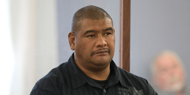 Former prison officer Alofainu'u Tuisamoa in the dock during his sentencing. Photo / Mark Mitchell