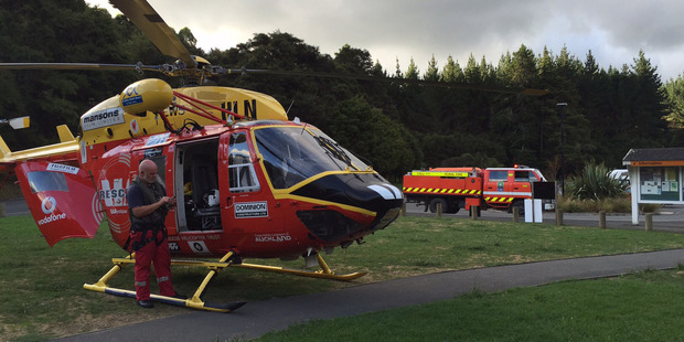Emergency services were called to the popular swimming spot shortly after 5.45pm. Photo / Auckland Westpac Rescue Helicopter