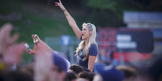 A fan rises above the crowd getting a better view of Action Bronson performing at the inaugural Auckland City Limits festival at Western Springs. Photo / Chris Louft