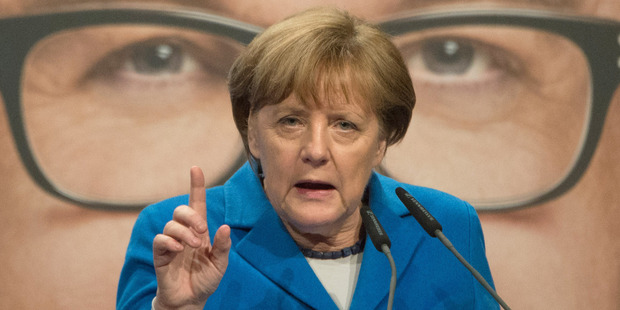 With two losses out of three, Angela Merkel's party is asking if it is time to rethink Germany's handling of the refugee crisis. Photo / AP