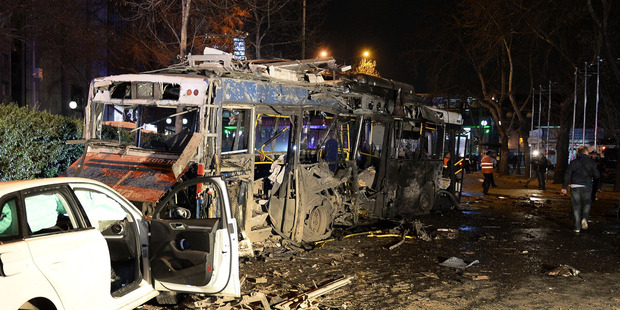 Damaged vehicles at the scene of an explosion in Ankara, Turkey. The explosion is believed to have been caused by a car bomb that went off close to bus stops. Photo / AP