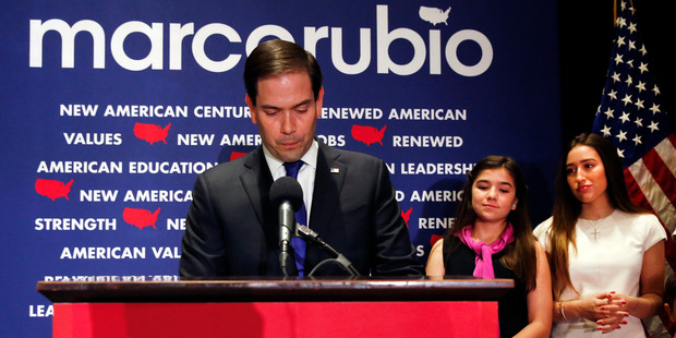 Marco Rubio is supported by his family after today's Republican primary defeat. Photo / AP