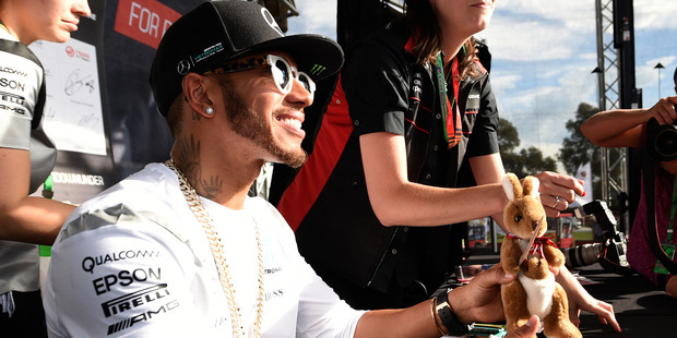 Lewis Hamilton answers questions, but none about his Harley-Davidson ride, before this weekend's Australian Grand Prix. Photo / AP