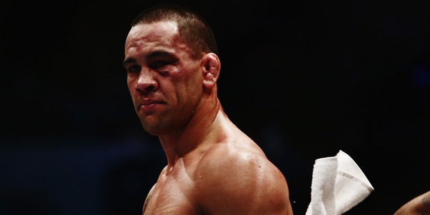 James Te Huna walks off after losing the UFC Middleweight bout against Nate Marquardt. Photo / Getty