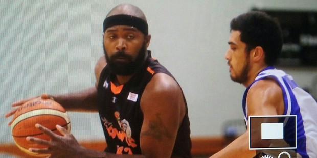Hawks US import Kareem Johnson (left) takes stock as Saints guard Shea Ili breathes down his neck in Napier. PHOTO/Paul Taylor