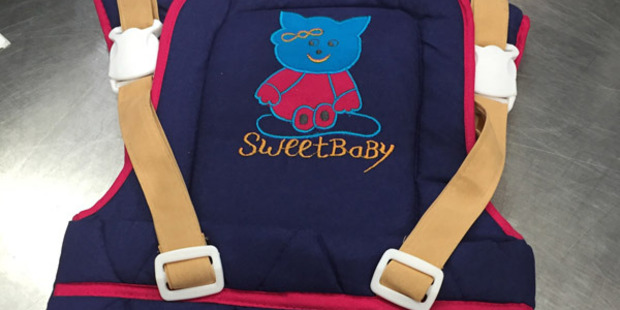 The carriers have the words "Sweet Baby" and a smiling teddy bear drawn across the front. Photo / Supplied