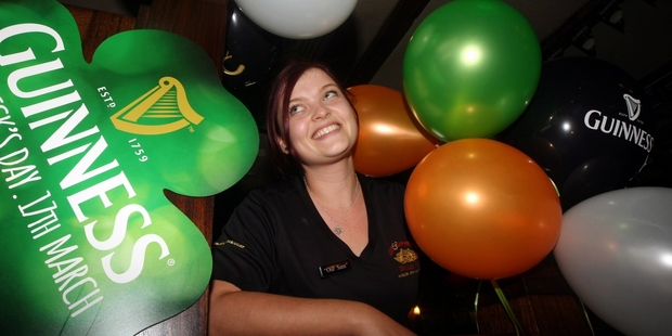 Rose and Shamrock Village Inn staff member Sammi Bell getting in the spirit for today's celebrations. PHOTO/PAUL TAYLOR