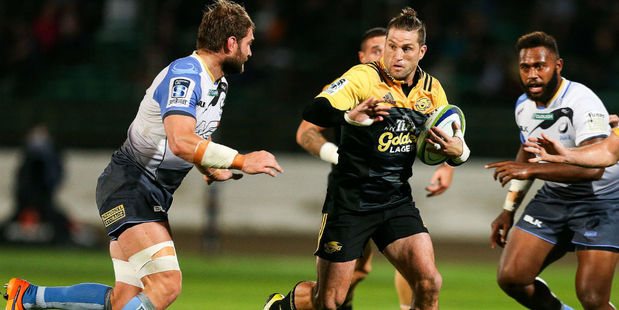 Cory Jane looks to fend off a Force defender. Photo / Getty